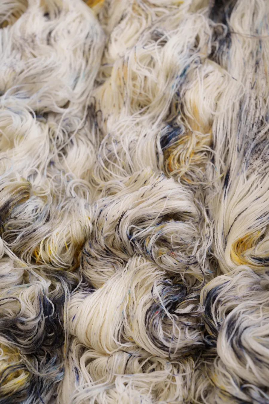 Close-up of speckled skeins after dyeing